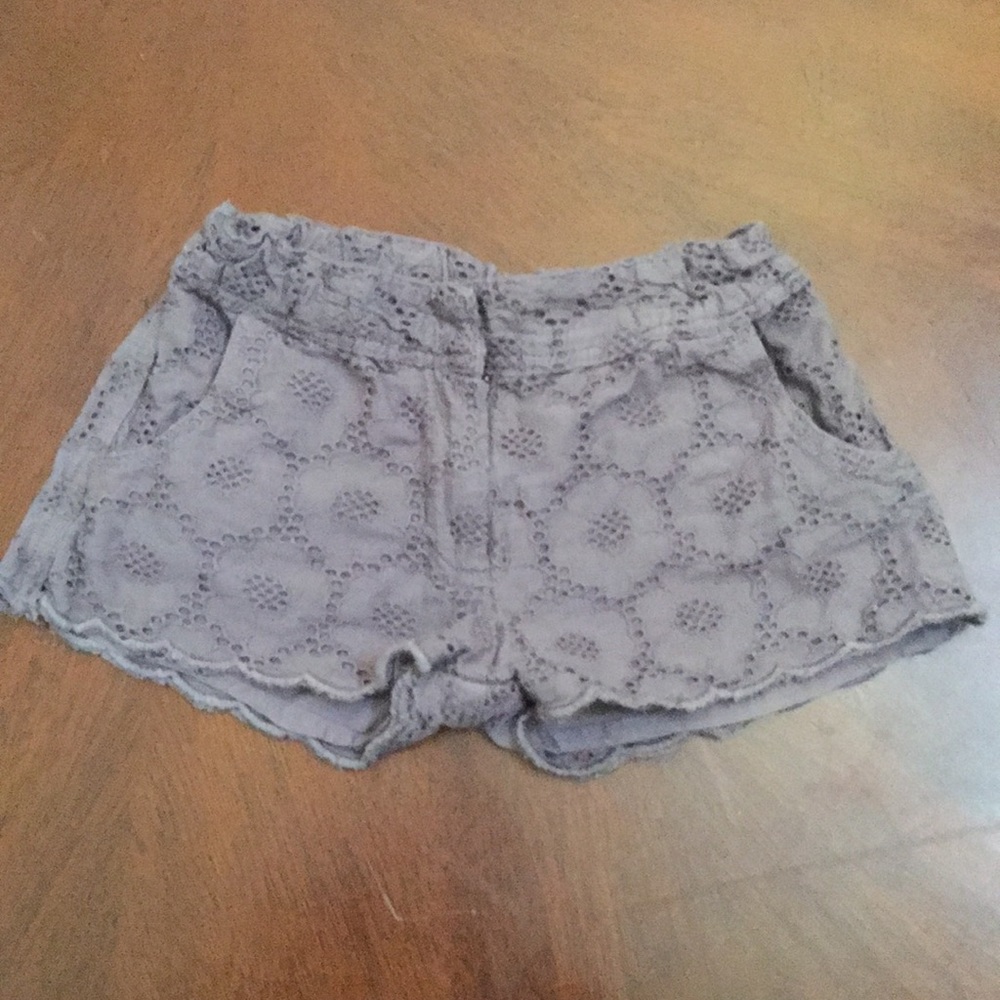 Gray eyelet shorts by Peek.